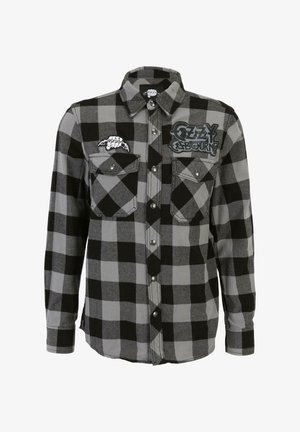 Juodas ir pilkas languotas flanelinis marškinis su ilgomis rankovėmis, snap užtrauktukais, dviem krūtinės kišenėmis ir pleistrais, kuriuose pavaizduota „Ozzy Osbourne“ logotipas ir šikšnosparnio dizainas.