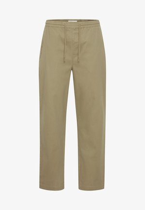 Minkšti medvilniniai khaki kelnės su laisvu siluetu, elastinga juosta su raišteliu ir šoninėmis kišenėmis. Lygus paviršius, be raštų.