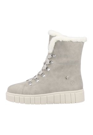 Gray suede ankle boot featuring a faux fur collar, metal lace hardware, and a thick white rubber sole with vertical grooves.