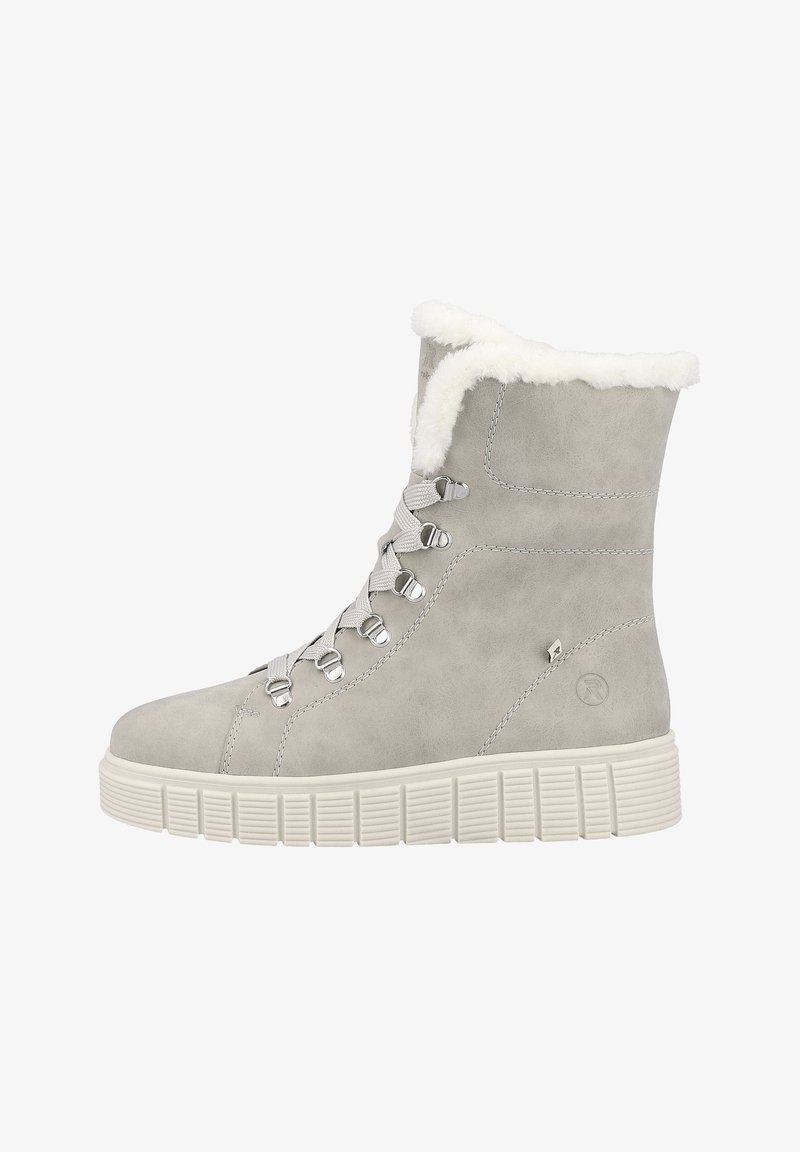 Graue Wildleder-Ankle-Boots mit einem Kunstpelzkragen, Metall-Lace-Hardware und einer dicken, weißen Gummisohle mit vertikalen Rillen.