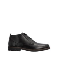 Bottine en cuir noire à la cheville avec lacets à l’avant, détails texturés autour des lacets et semelle basse bordée de marron.