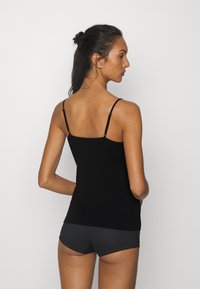 MAGIC Bodyfashion CAMI - Camisola interior - black