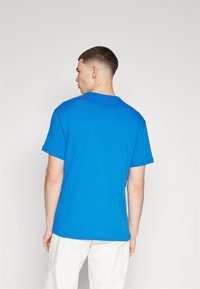Tommy Jeans Camiseta básica - persian blue