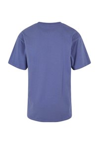 Short-sleeve, crew-neck t-shirt in a solid violet fabric. Features a relaxed fit with a smooth texture and no visible graphics or patterns.