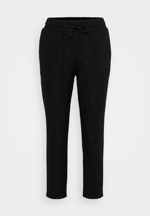 Pantalones negros de corte relajado, hechos de una tela suave, con una cintura elástica y cordón, y piernas ajustadas. Sin patrones ni acentos visibles.