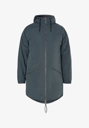 Hosszú, sötétzöld pufi dzseki kapucnival, teljes hosszúságú cipzárral és két ferde elülső zsebbel, finom textúrával és állítható aljjal.