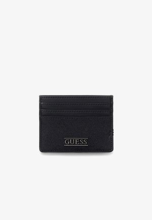 Porte-cartes noir en cuir et tissu texturé. Dispose de plusieurs compartiments et d'un logo métallique "GUESS" à l'avant.