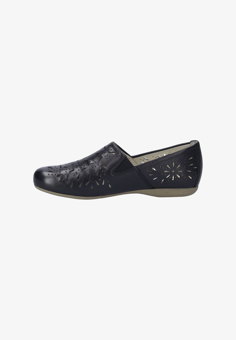 Black leather slip-on shoes featuring laser-cut floral designs, a rounded toe, and a contrasting beige sole for added comfort.