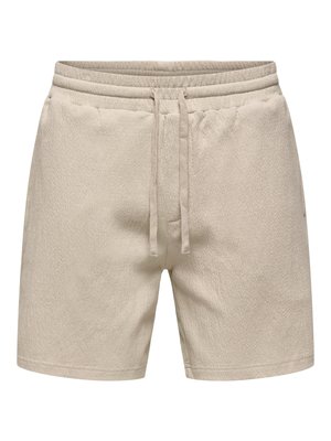 Shorts décontractés beige clair avec taille élastique et cordon de serrage, faits en tissu texturé, avec poches latérales.