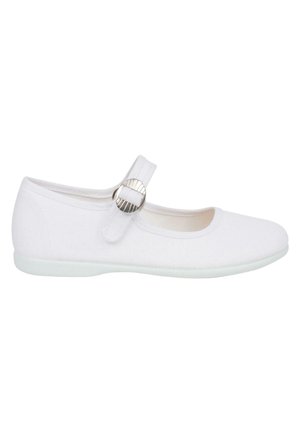White fabric ballet flat with a round toe, adjustable strap, and silver buckle detail. Soft texture and flexible, light sole.