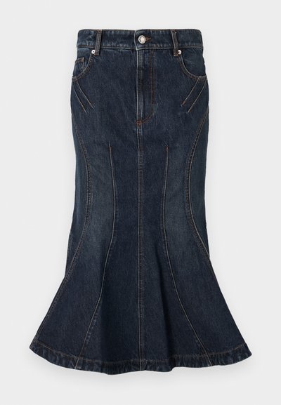 Dark blue denim skirt with a flared bottom, featuring a mid-rise waist, five-pocket design, and contrasting stitching details along the seams.