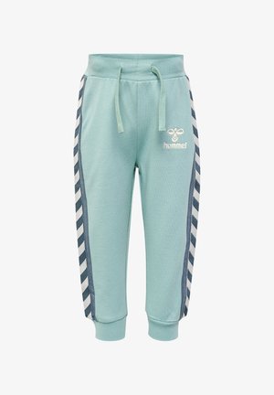 Lyseblå bomulds sweatpants med snørebånd i taljen, side-striber med et diamantmønster og et broderet logo på forsiden.