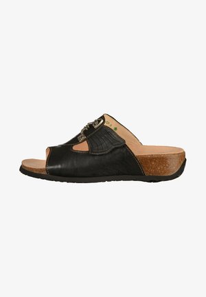 Black leather slide sandal with a peep toe, textured accents, and a cork midsole, featuring a decorative metal buckle on the side.