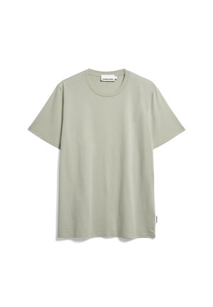 Light green cotton T-shirt with a crew neck, short sleeves, and a relaxed fit; features a label at the lower side seam.