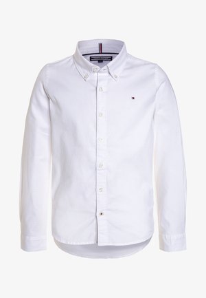 Weißes Langarm-Hemdkariert mit Knopfverschluss und Button-Down-Kragen, kleinem Tommy Hilfiger-Logo auf der Brust und gebrandetem Innenkragenetikett.