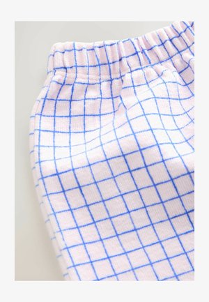 Tessuto rosa con superficie testurizzata caratterizzata da un motivo a griglia di linee blu. La fascia in vita è elasticizzata per garantire comfort.