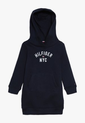 Marineblå hættetrøjekjole med frontlomme og hvid "HILFIGER NYC" tekst samt lille flaglogo på brystet.