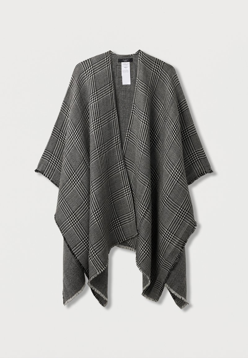 Fekete-fehér kockás köpeny, nyitott elülső dizájn, puha anyag, rojtokkal díszített szélek, strukturált esés. Címke látható a nyaknál.