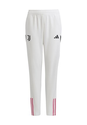 Pantalons de sport blancs avec une coupe slim, ornés de logos noirs et de deux rayures roses sur les côtés inférieurs. Fabriqués en matériau lisse et flexible.