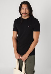 Tommy Jeans OTIS STRAIGHT - Straight leg jeans - fatigue green