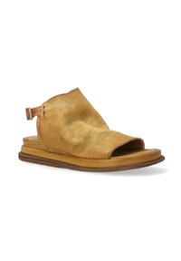 Yellow leather sandal with open toe, soft textured upper, and an adjustable strap. Features a flat, cushioned sole for comfort.