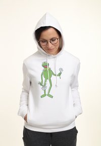 Biała bluza z kapturem featuring zielony nadruk Kermita z Muppets trzymającego kwiaty. Materiał jest miękki, z kapturem na sznurki i ściągaczami.