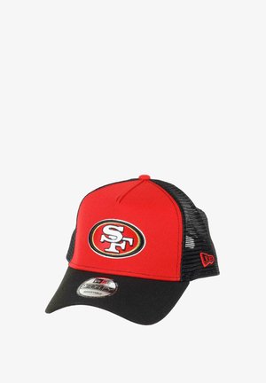 Red and black cap with mesh back, featuring an embroidered SF logo and a flat visor. Adjustable strap with New Era branding detail.