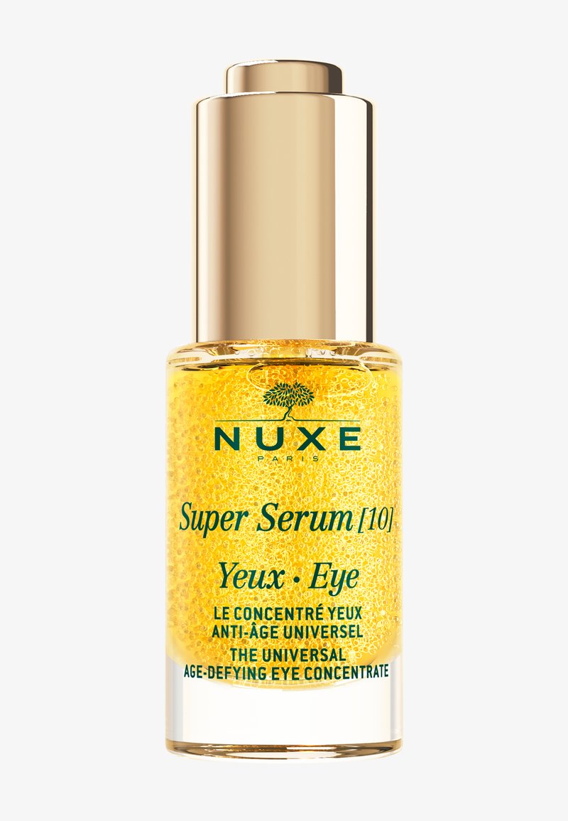 Nuxe Super Serum Augen-Konzentrat in einer klaren Flasche mit goldfarbenem Verschluss, enthält gelbes Gel mit sichtbaren Mikrokügelchen.