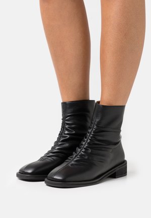 WRINKLE CHELSEA BOOTS - Classic ankle boots - black
