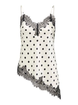 Kamerka z kości słoniowej z jedwabiu z czarnymi groszkami, czarną koronkową lamówką wzdłuż dekoltu i asymetrycznym dołem oraz cienkimi, regulowanymi ramiączkami.