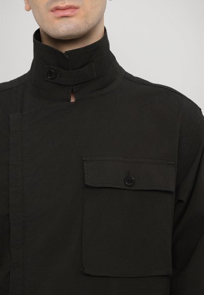Henrik Vibskov MIDDLE UNISEX - Kombinezon - black