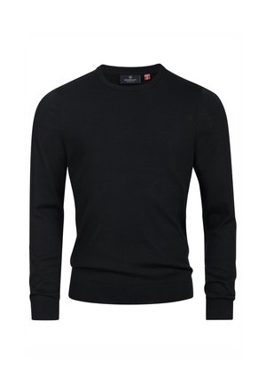 Zwarte trui met een ronde hals, lange mouwen en geribde manchetten en onderrand. Getextureerde stof met een subtiele glans. Etiket aan de hals.