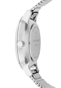 Stainless steel watch with a round case, mesh band, and textured back featuring brand engraving. Water-resistant up to 30m.