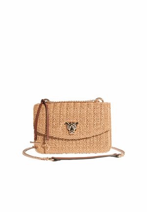 Beige woven crossbody bag with a chain strap and cheetah head emblem on the front flap.