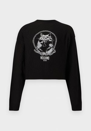 Mustast kootud kampsun, millel valge tikitud kass prillide ja kikilipsuga köie sees, all tekst "Moschino Jeans".