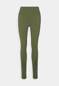 Oliwkowe legginsy z wysokim stanem, gładką teksturą i perforowanymi detalami wzdłuż dolnej części nóg w wzór falisty.