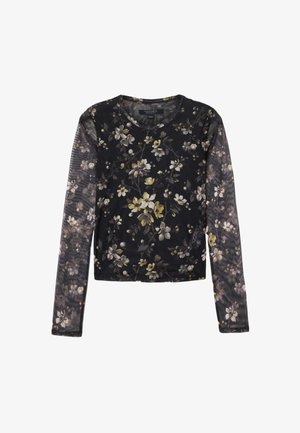 Langærmet top i letvægtsstof med sort bund, der har et blomsterprint i hvid og gul, rund halsudskæring og figursyet design.