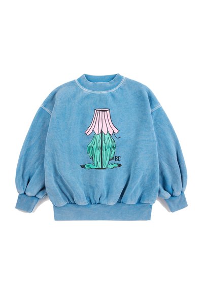 Sweat-shirt bleu oversize avec un motif de fleur abstraite rose et verte centré sur le devant et des poignets et un bas côtelés.