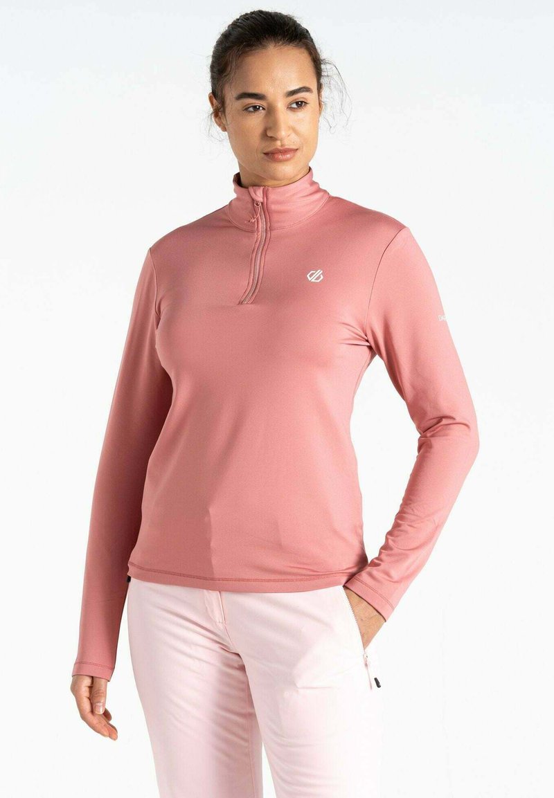 Helles rosa langärmliges Oberteil mit hohem Kragen und halbem Reißverschluss. Glatter, dehnbarer Stoff mit kleinem Logo auf der linken Brust und taillierter Passform.
