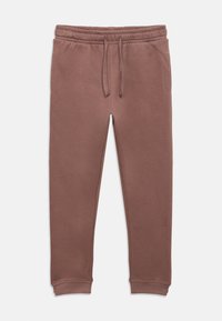 Καφέ φόρμες με ελαστική μέση και ρυθμιζόμενο κορδόνι, με τελειώματα μανσέτας και πλαϊνές τσέπες. Μαλακή υφή υφάσματος.