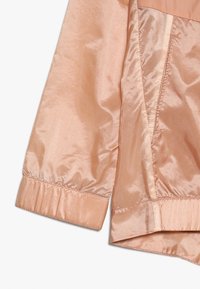 Nike Performance Træningsjakke - gold-coloured