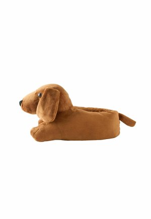 Brauner Plüschhundekissen mit weicher Textur, runder Körper, schlaffe Ohren und schwarze Knopfaugen. Der Schwanz erstreckt sich von hinten.