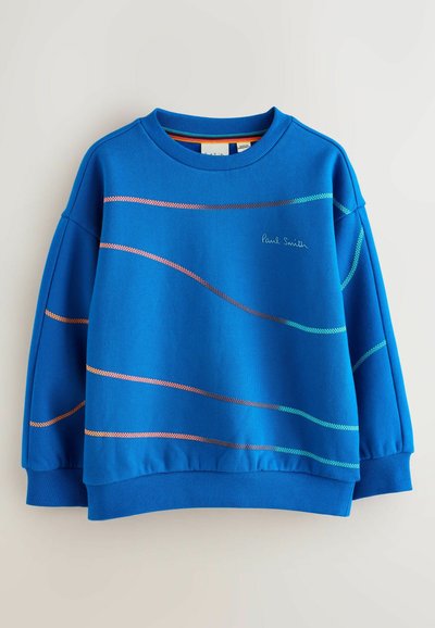 Modrá mikina s dlhými rukávmi, s zakrivenými viacfarebnými prúžkami a vyšitým detailom loga. Rúbky na rukávoch a leme sú rebrované.