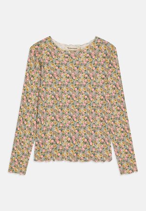 Langærmet bluse med rund halsudskæring, med et blomsterprint i pink og gul på grå baggrund. Tekstureret, blødt stof med en bølget kant.