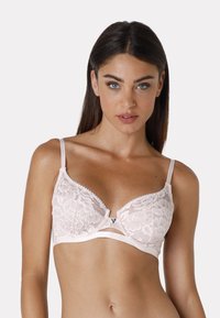 Bralette in pizzo rosa con motivo floreale, supporto con ferretto, bordi scallop e spalline regolabili. Chiusura con gancio metallico al centro frontale.