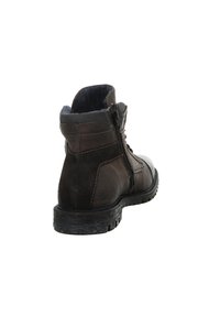 Braune Leder-Stiefeletten mit einem seitlichen Reißverschluss, strukturiertem Finish, gepolstertem Kragen und robuster schwarzer Gummisohle.