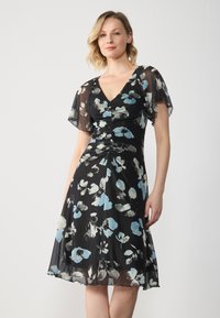 Floral midi dress in black, featuring blue and gray abstract patterns, short sheer flutter sleeves, and a fitted waist with gathering details.