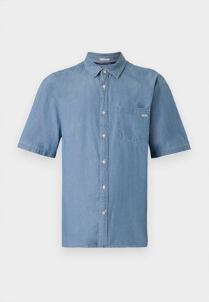 Lühikeste varrukatega nööpidega särk helesinisest denimist. Omab ühte rinda taskut ja klassikalist kraed. Pehme tekstuur ja lõdva istuvusega.