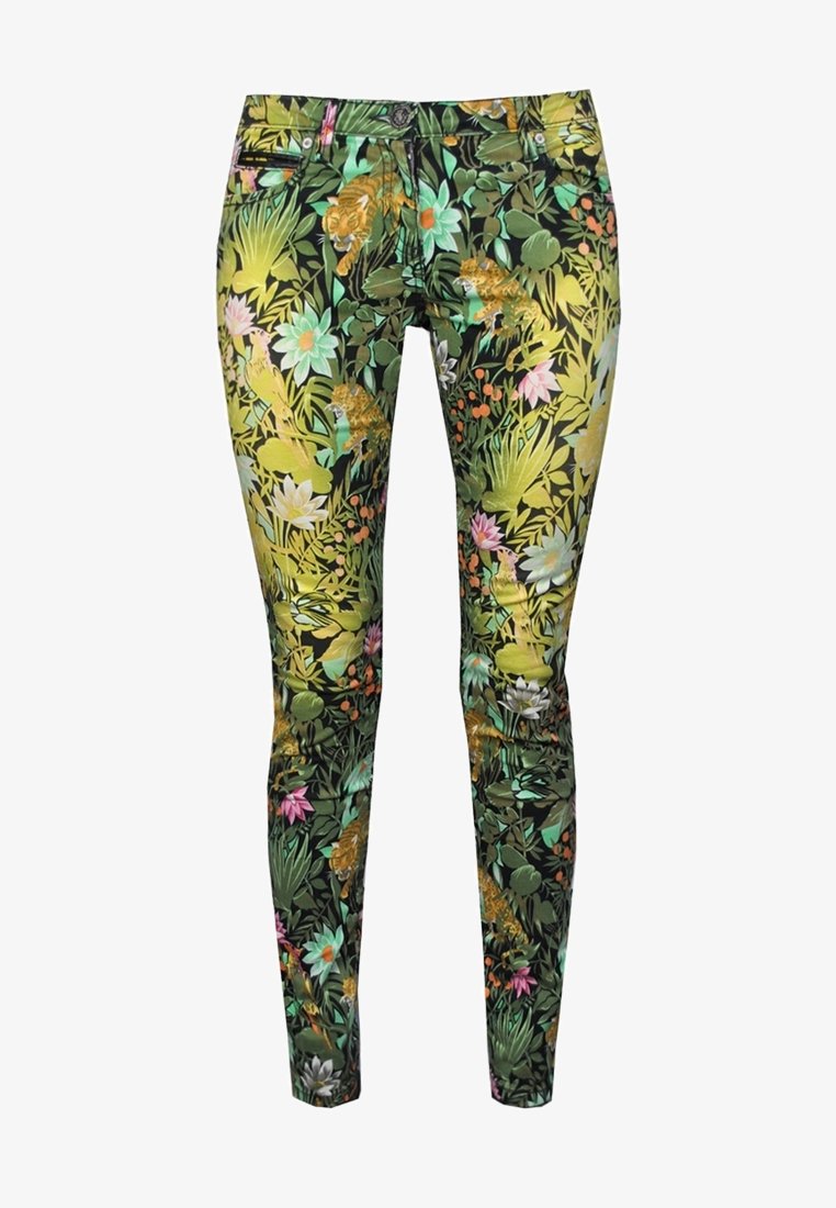 Jeans skinny con estampado floral en un vibrante verde y amarillo, hechos de una tela elástica. Presentan diversas flores y animales a lo largo del diseño.