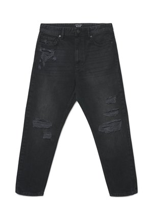 Jeans in denim nero con dettagli consumati, con strappi e bordi sfrangiati. Design classico a cinque tasche e chiusura con bottoni. Vestibilità classica.